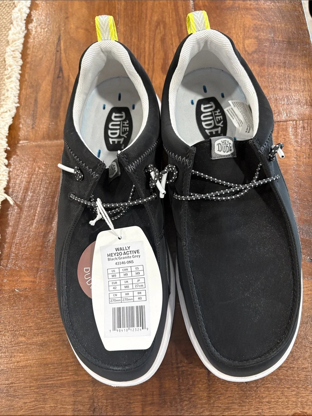 Hey Dude Wally Active Black with Yellow Heel Tab Men's Slip-Ons